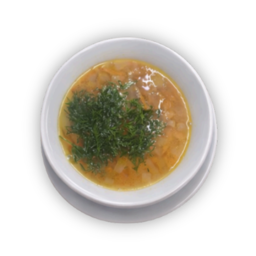 Baltoje keraminėje lėkštutėje pastatytas baltas keraminis dubenėlis su geltonai oranžine sriuba ir